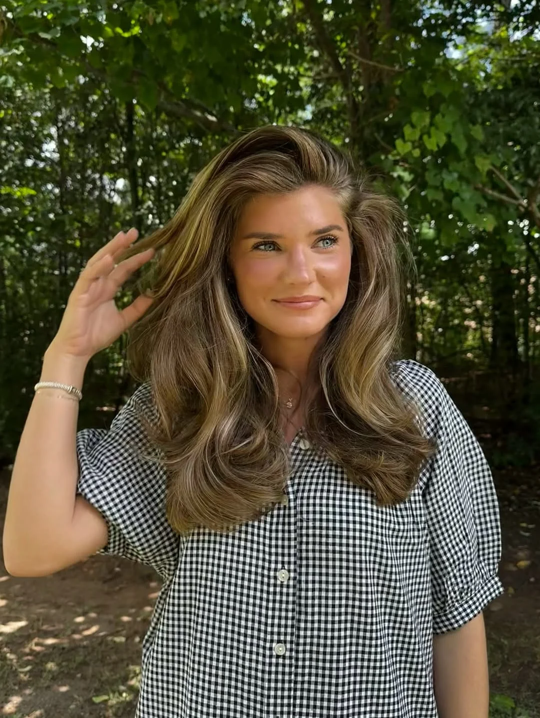 stylish summer haircut for round face 2026 Voluminous Summer Blowout With Face-Lifting Layers