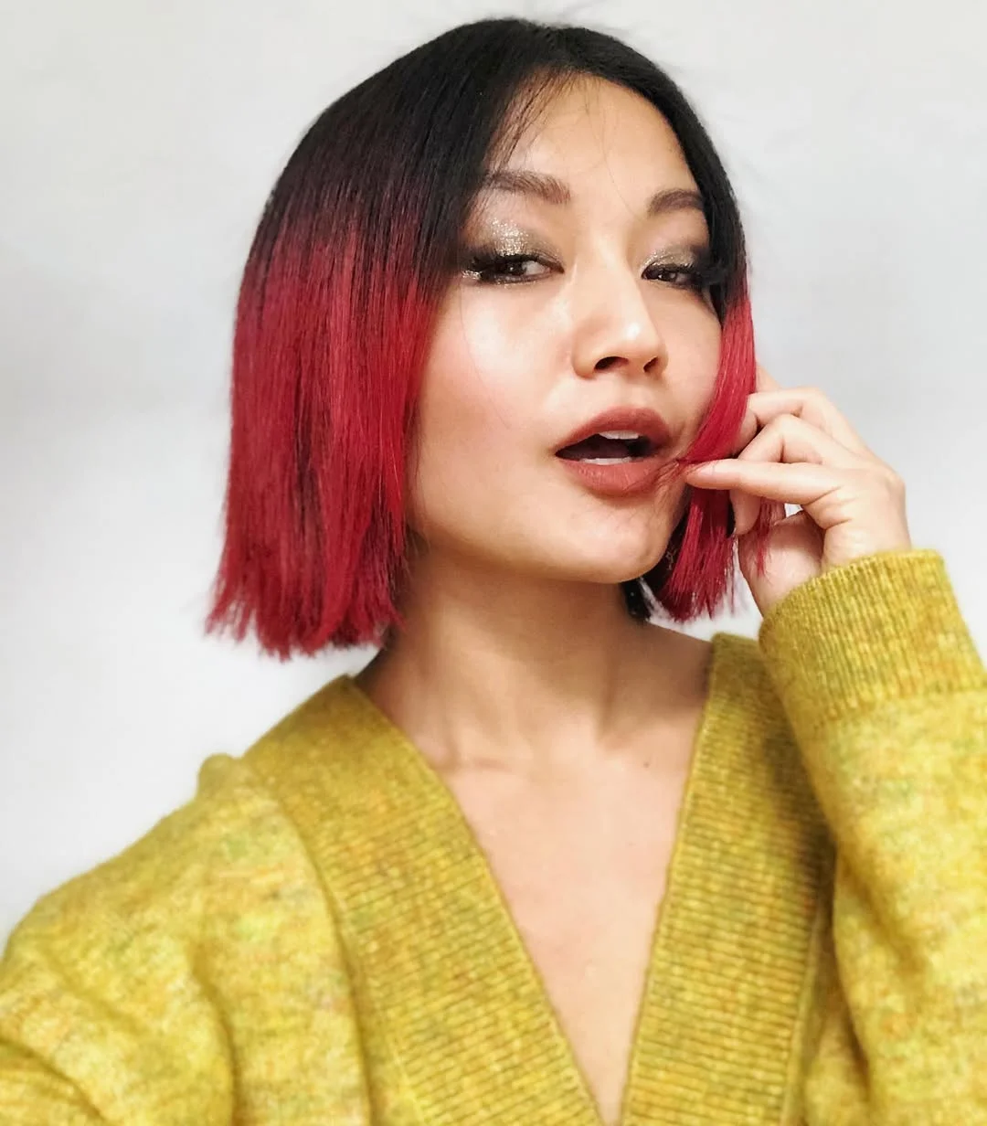 stylish summer haircut for round face 2026 Bold Cherry Dip-Dye Bob With Graphic Precision