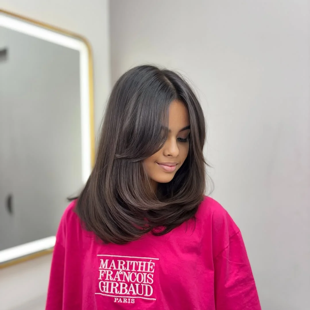 stylish summer haircut for round face 2026 Polished Shoulder-Length Blowout With Floating Layers