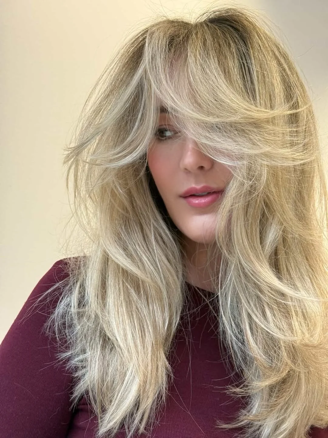 stylish summer haircut for round face 2026 Buttercream Butterfly Layers With Feathered Volume