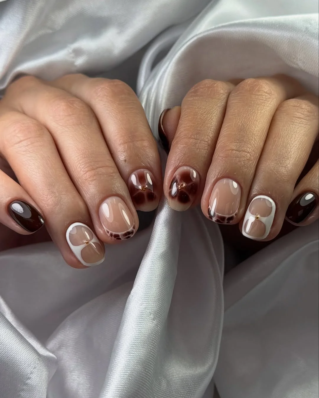 summer toe nails colors 2026 Glossy Mocha Floral Nails With Elegant Neutral Contrast