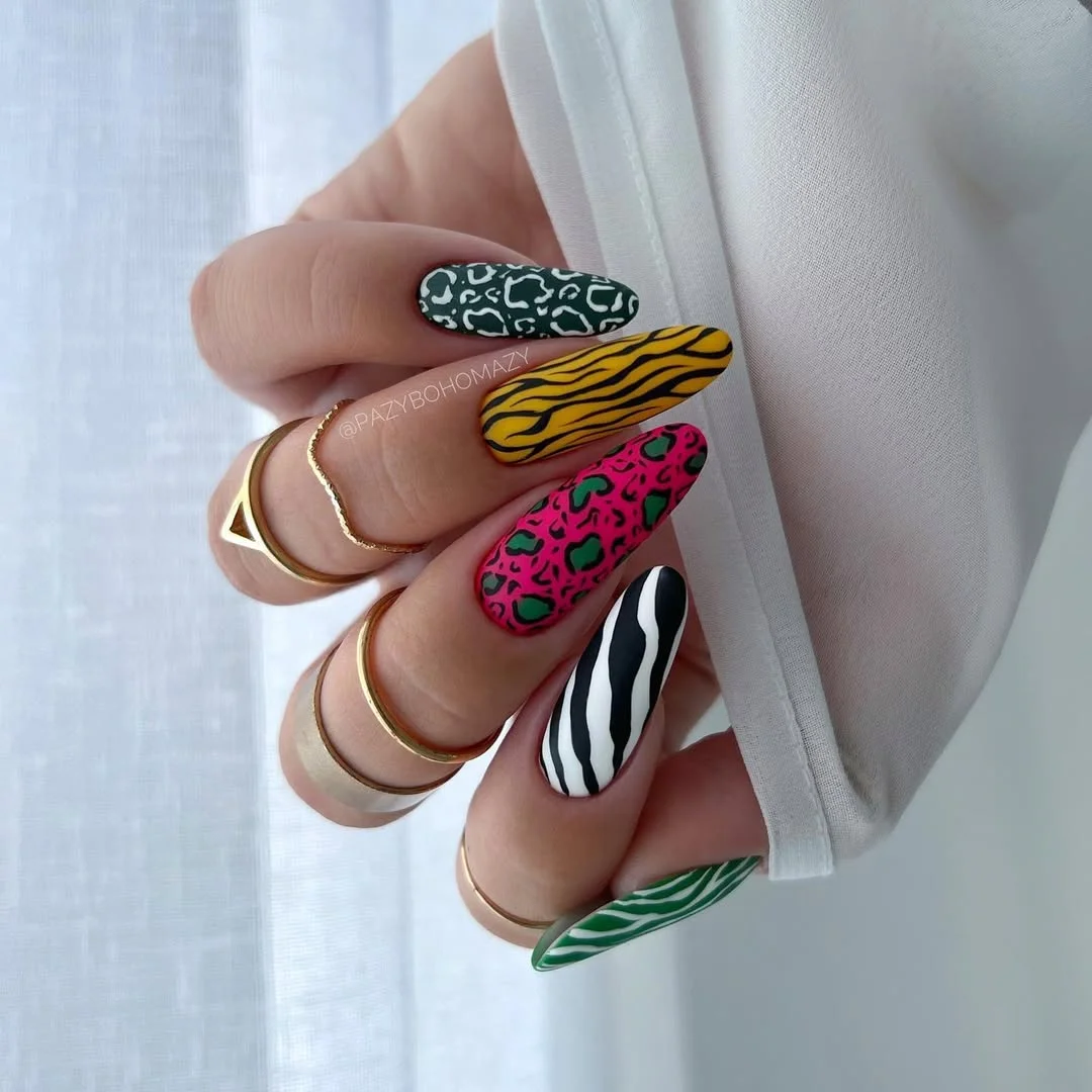 summer toe nails colors 2026 Bold Mixed Animal Prints With Maximalist Summer Energy