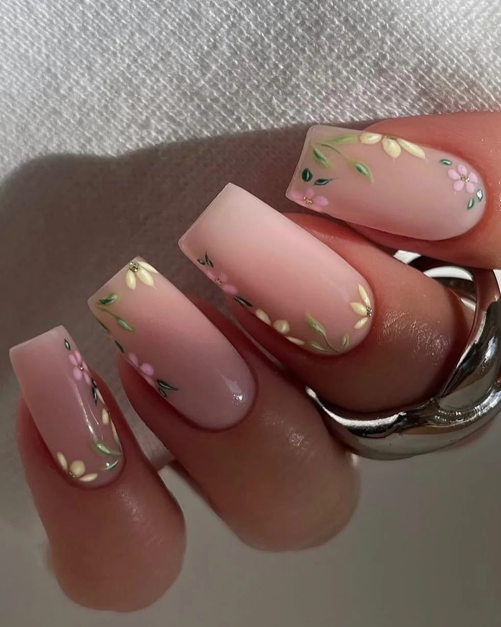 summer toe nails colors 2026 Soft Pink Botanical Nails With Delicate Floral Details