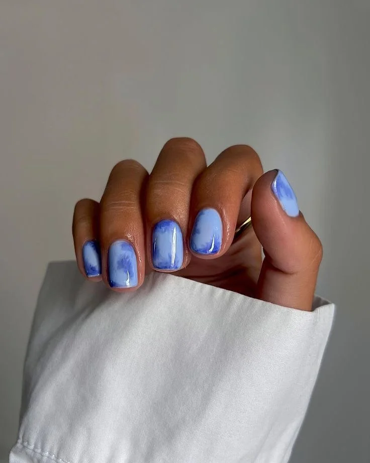 summer dip nails 2026 Cloudy Blue Dip Nails With Airbrushed Finish