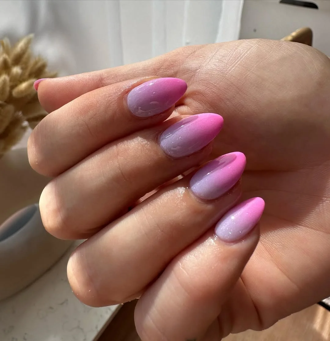 summer dip nails 2026 Pink Ombre Almond Nails With Milky Glow
