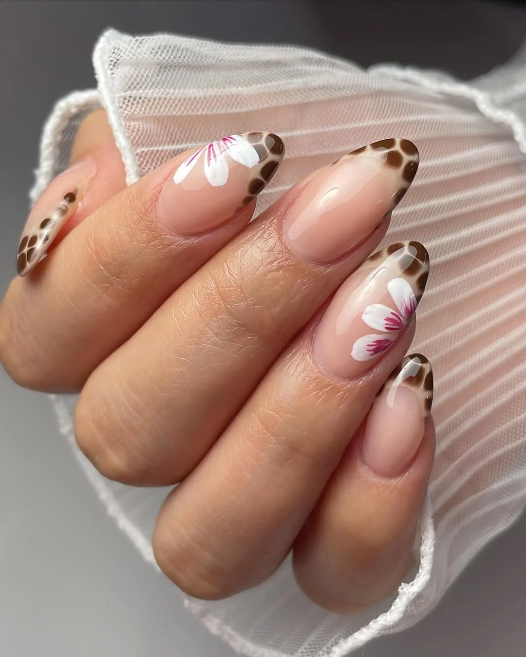 summer dip nails 2026 Floral Tortoiseshell French Nails With Soft Nude Base