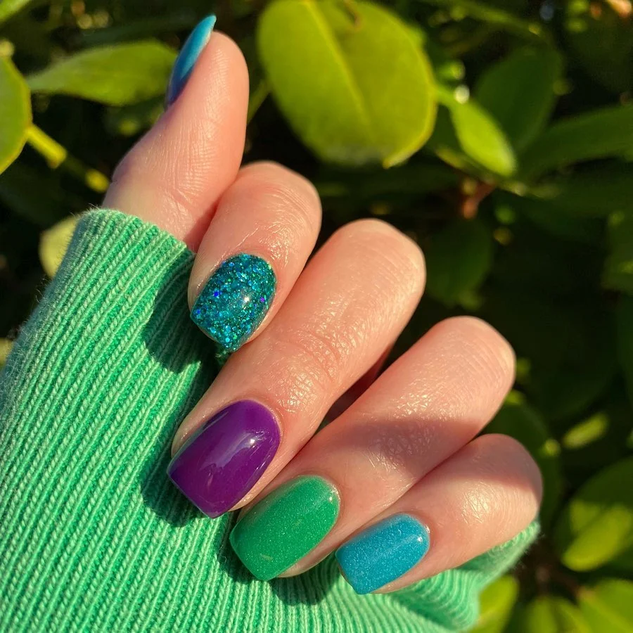 summer dip nails 2026 Jewel-Toned Dip Powder Nails With Mermaid Sparkle