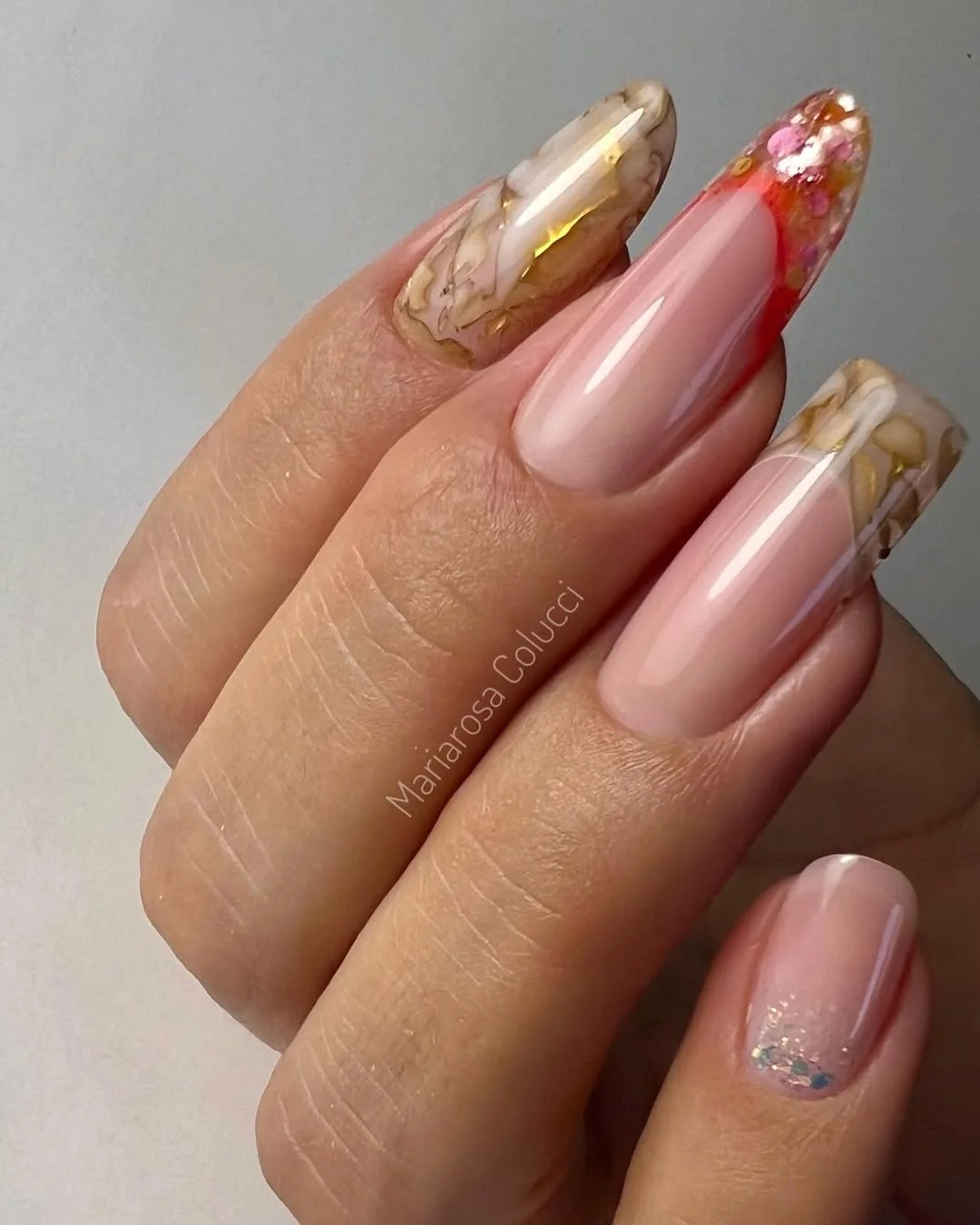 summer dip nails 2026 Glossy Nude Marble Nails With Gold Detail