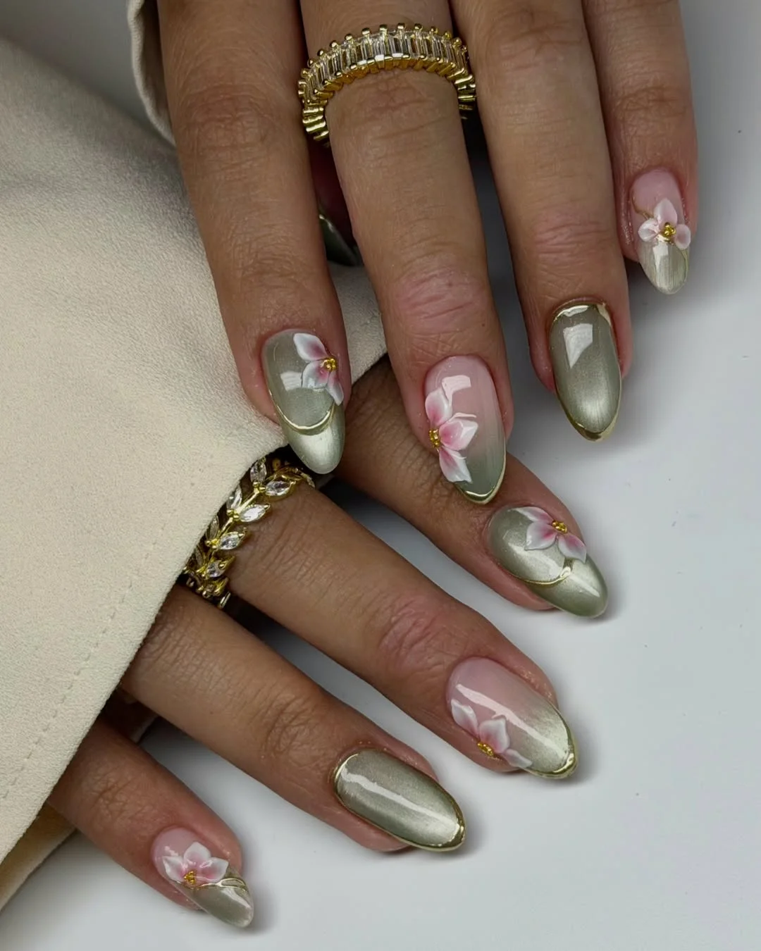 summer gel nails 2026 Glossy Sage Chrome With Delicate Floral Details