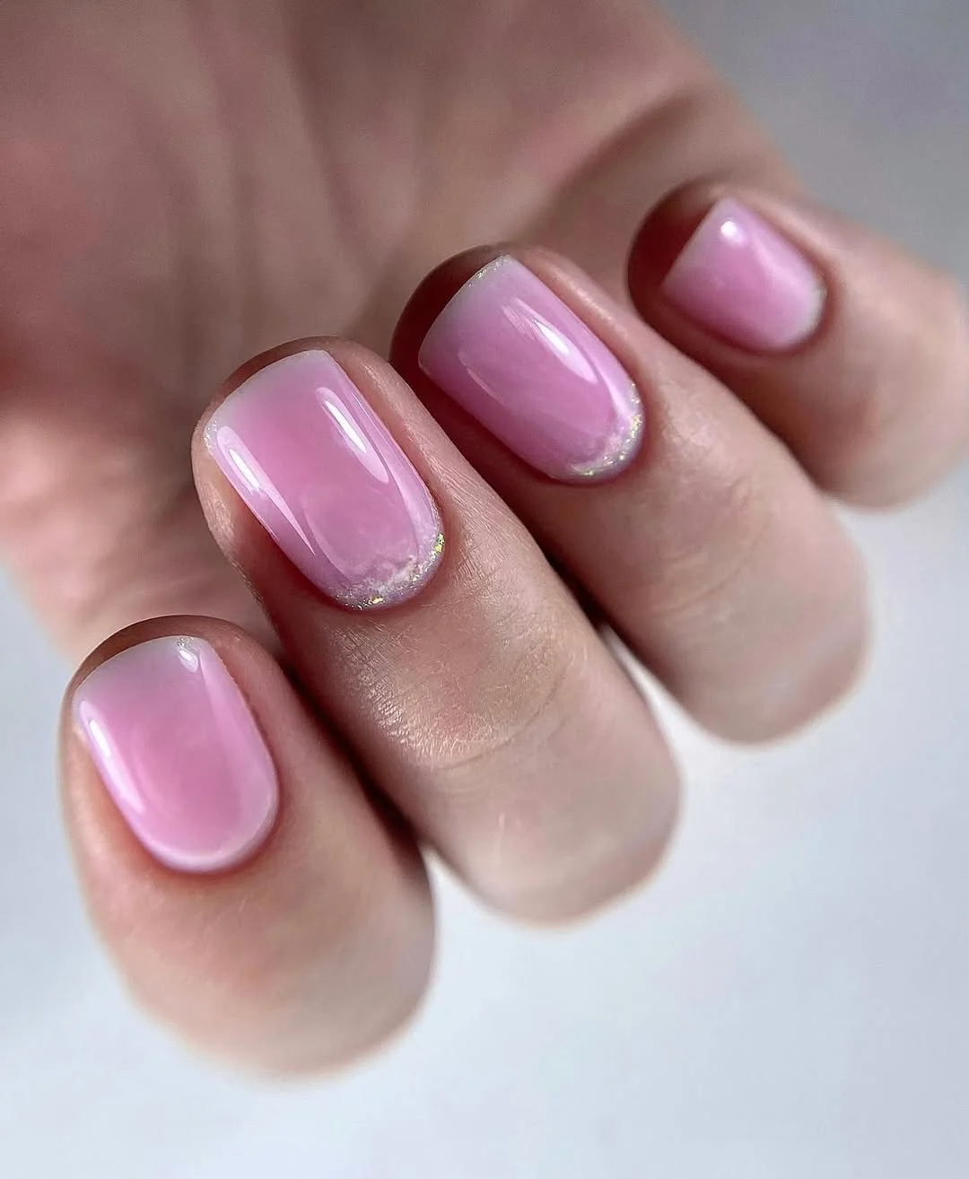 summer gel nails 2026 Soft Pink Gloss Nails With Minimal Glitter Accents