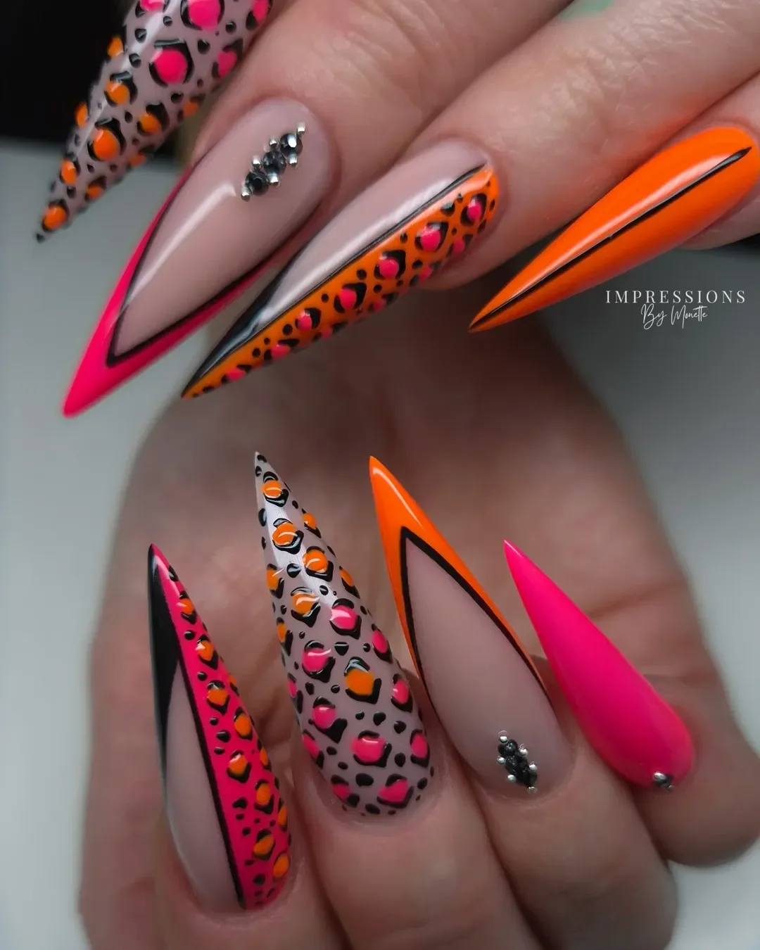 summer gel nails 2026 Neon Leopard Stiletto Nails For Bold Summer Energy