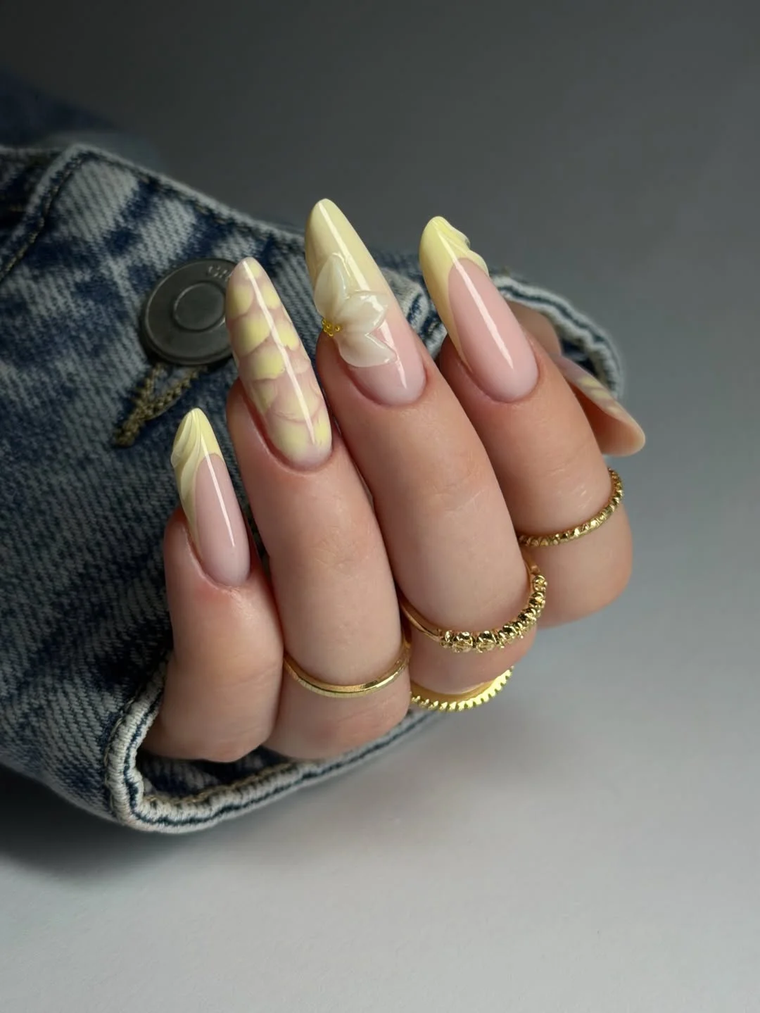summer gel nails 2026 Butter Yellow Almond Nails With Soft Floral Layers