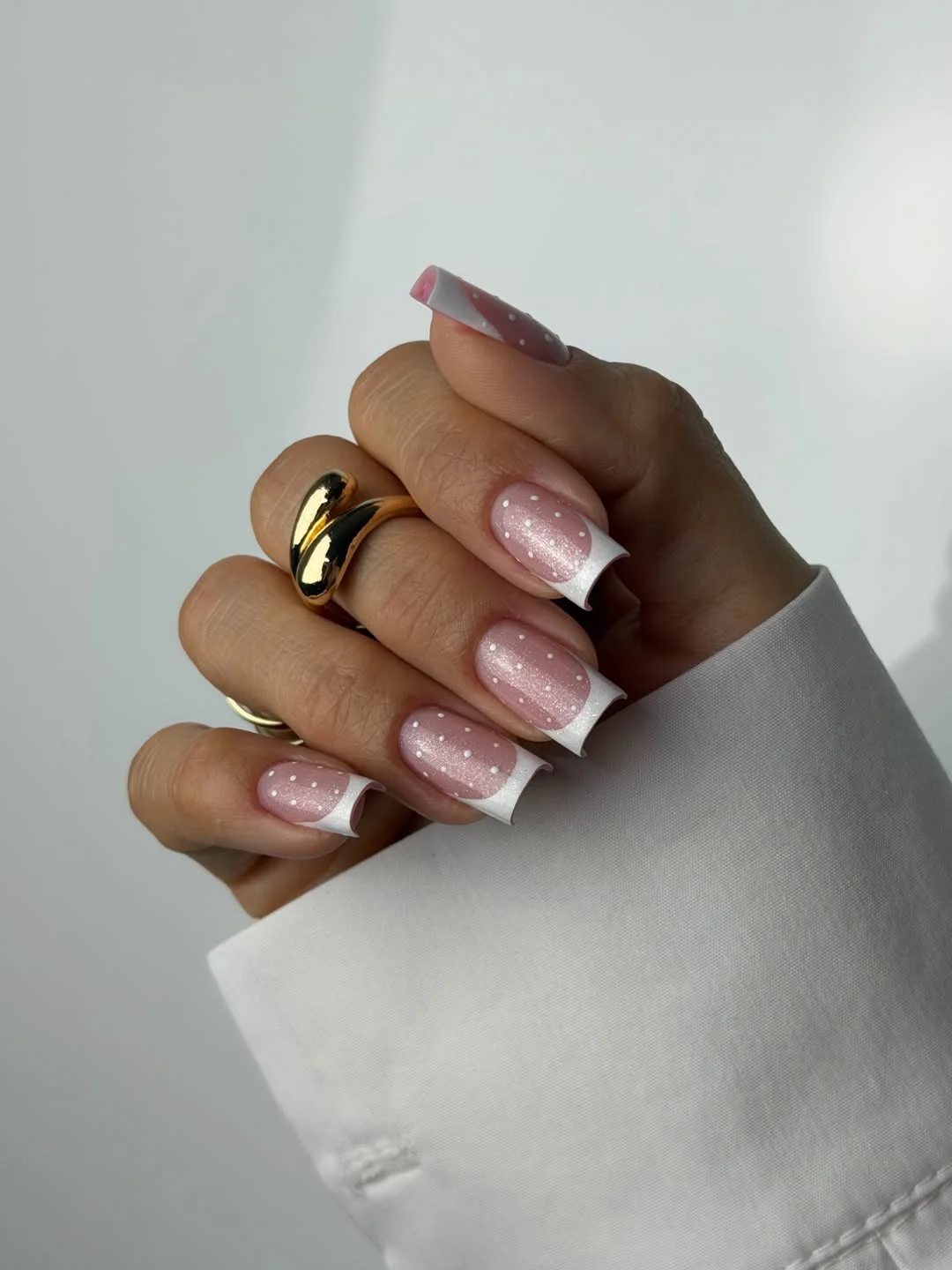 summer gel nails 2026 Shimmery French Tips With Tiny Polka Dot Details