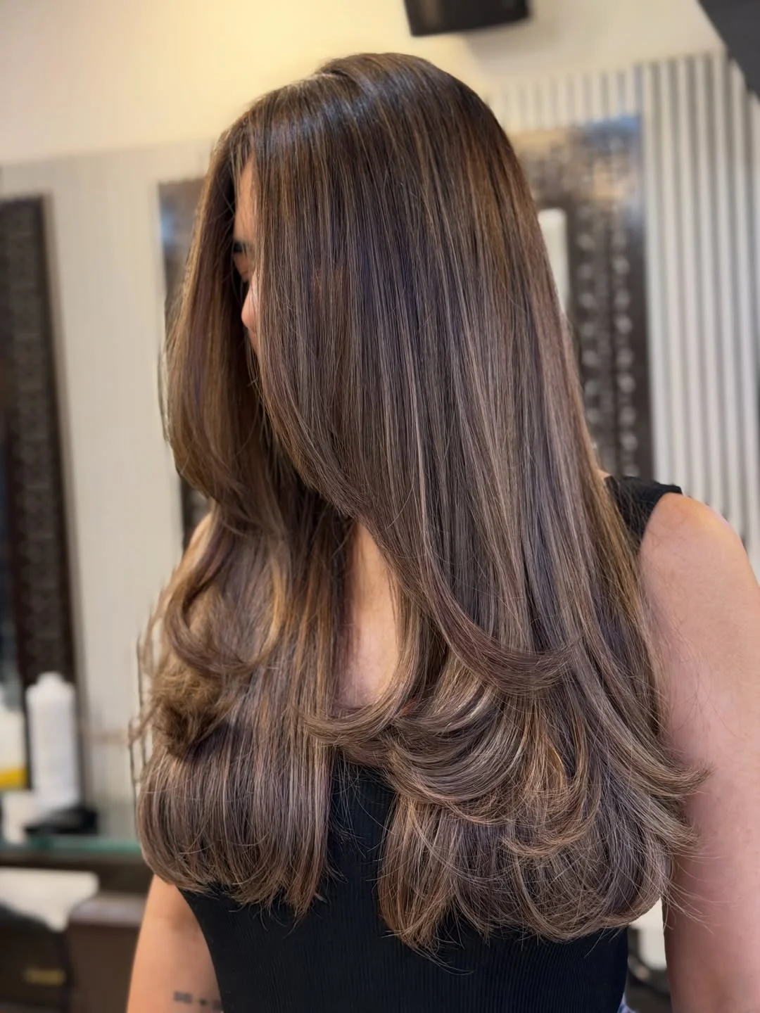 summer hair color ideas to inspire you 2026 Glossy Neutral Brunette with Feathered Layers