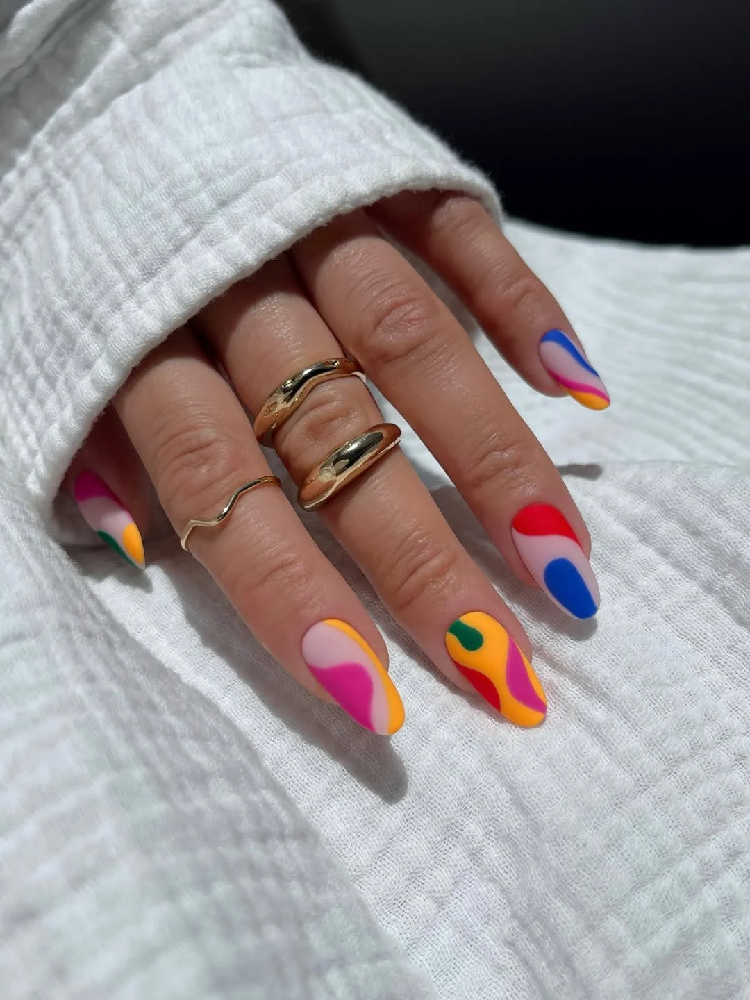 summer manicure color ideas 2026 Abstract Rainbow Swirls for a Modern Art Summer Mood