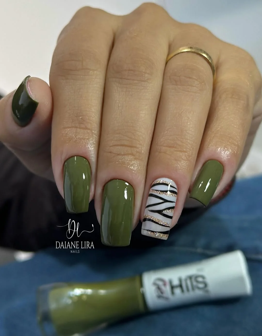 summer manicure color ideas 2026 Olive Green Nails With a Chic Zebra Accent