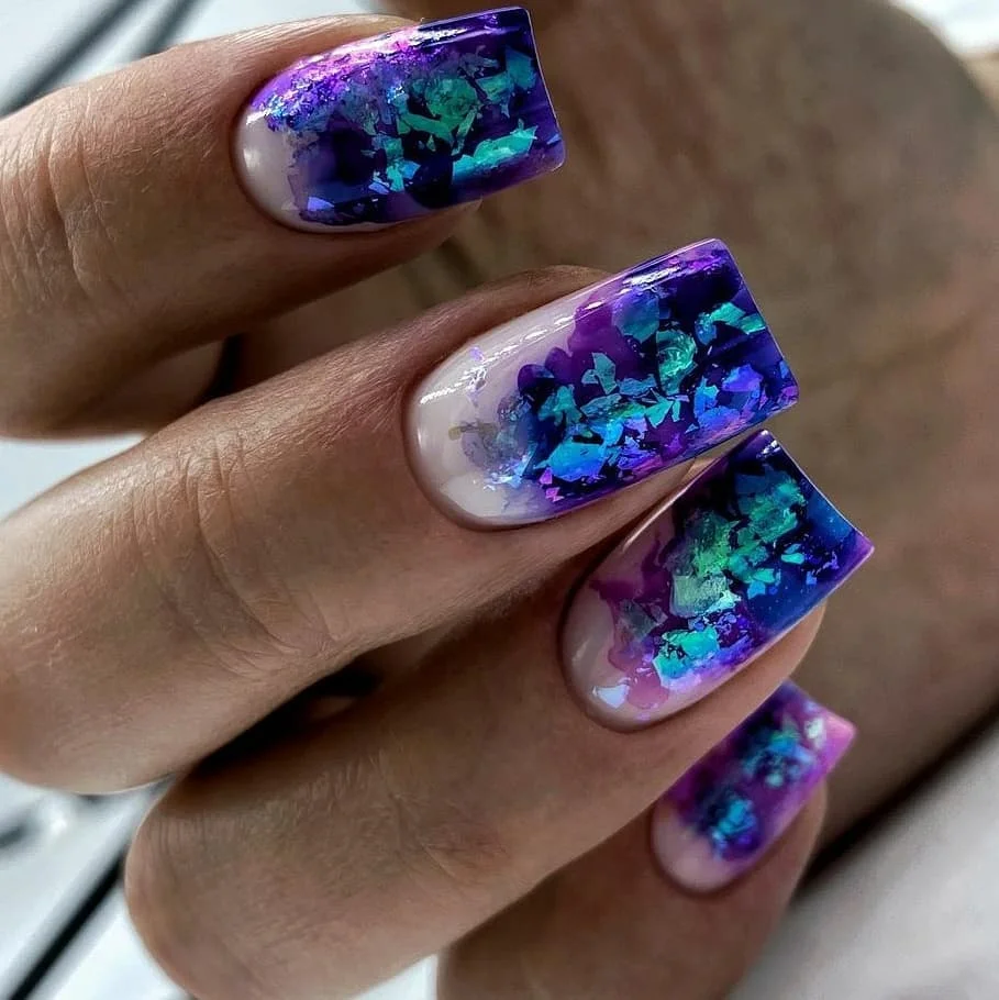 summer nail colors 2026 Galaxy Foil Nails With Electric Purple Shine