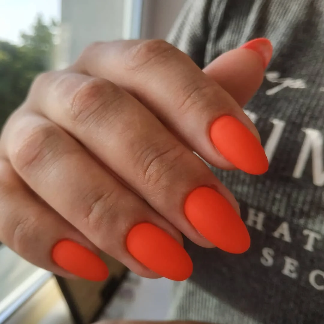 summer nail colors 2026 Matte Neon Coral Nails That Scream Summer