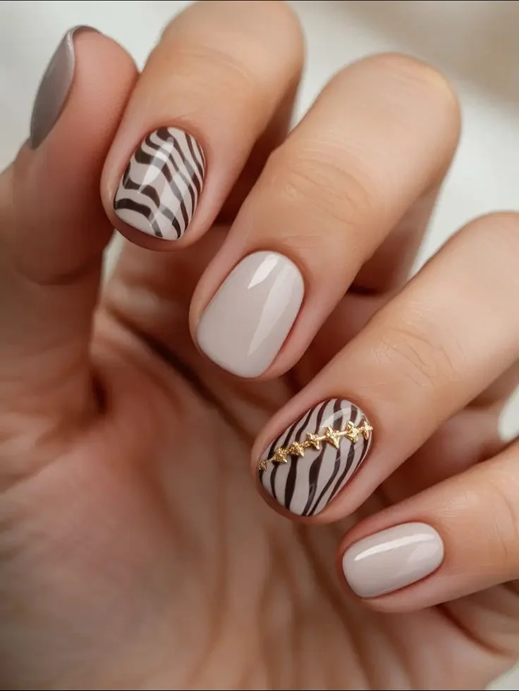 summer nail colors 2026 Zebra Swirl Neutrals With Gold Details