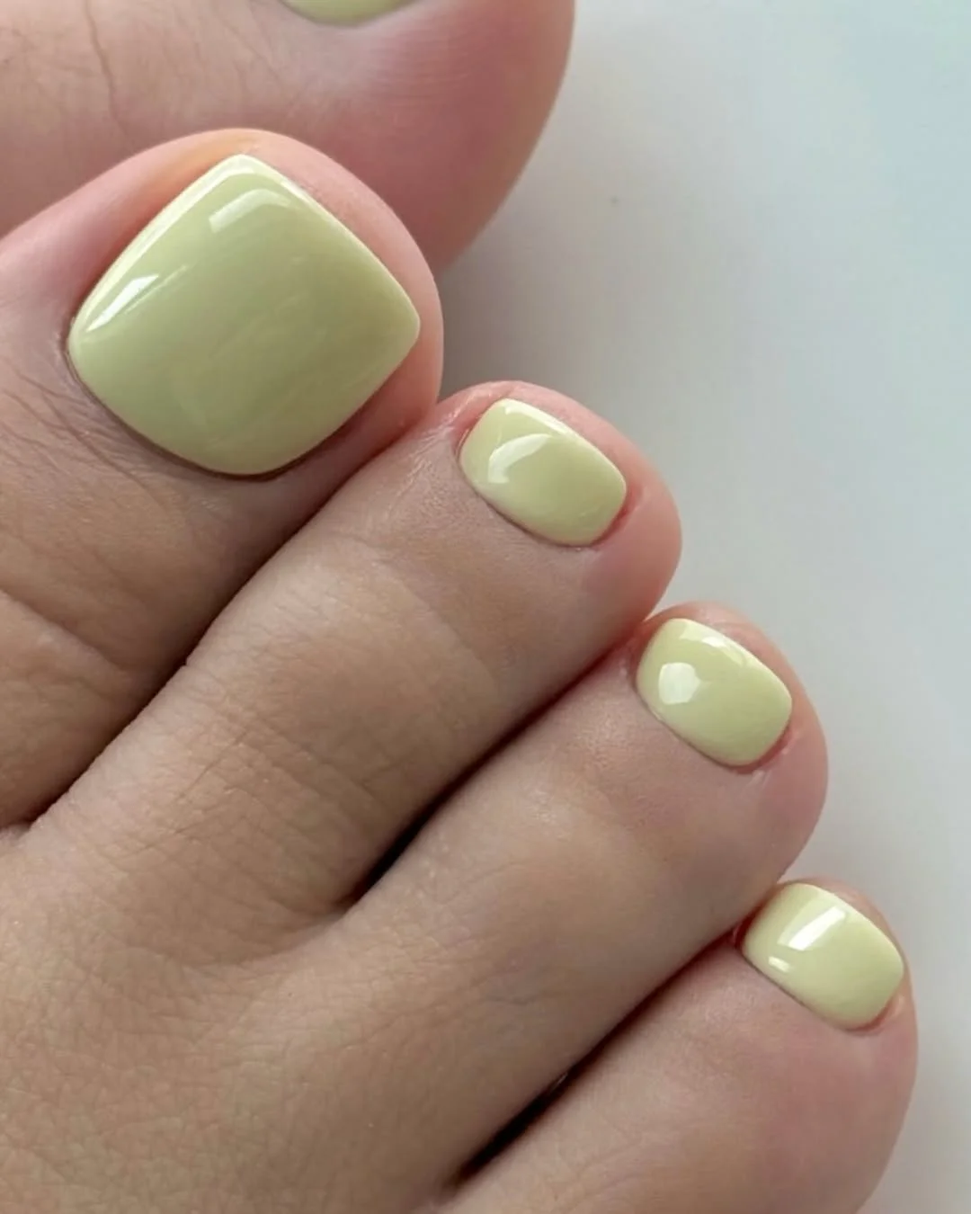 summer toe nails colors 2026 Butter Yellow Pedicures That Feel Soft and Expensive