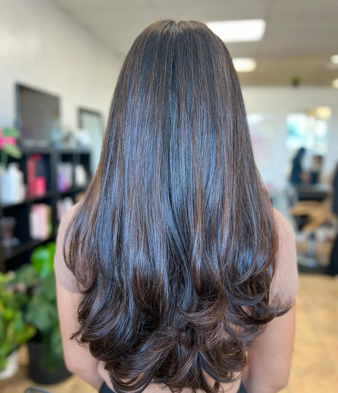 trendy summer brunette hair color 2026 Glossy Espresso Brunette With Soft Flipped Ends