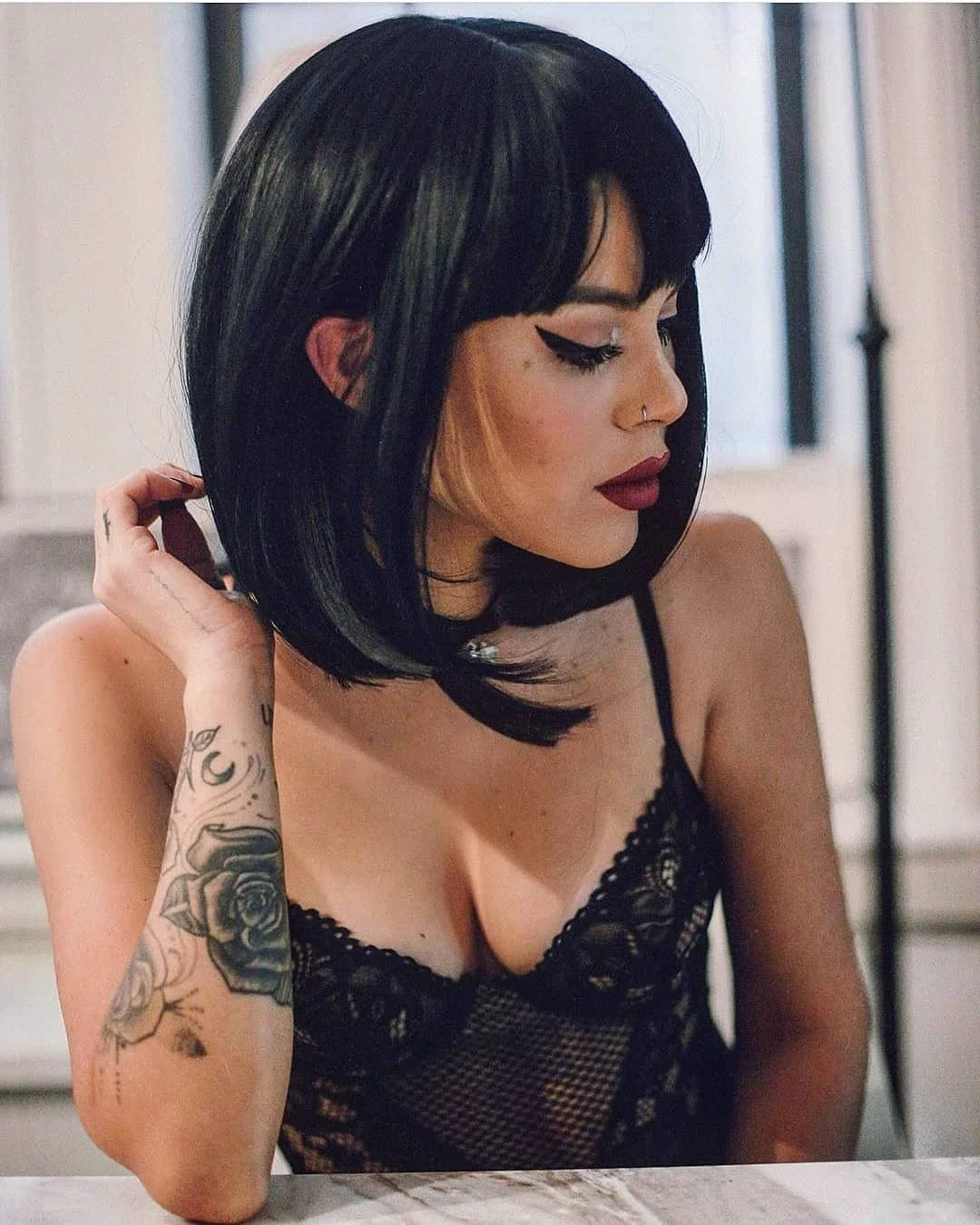 trendy summer brunette hair color 2026 Dark Brunette Bob With Bold Micro Bangs