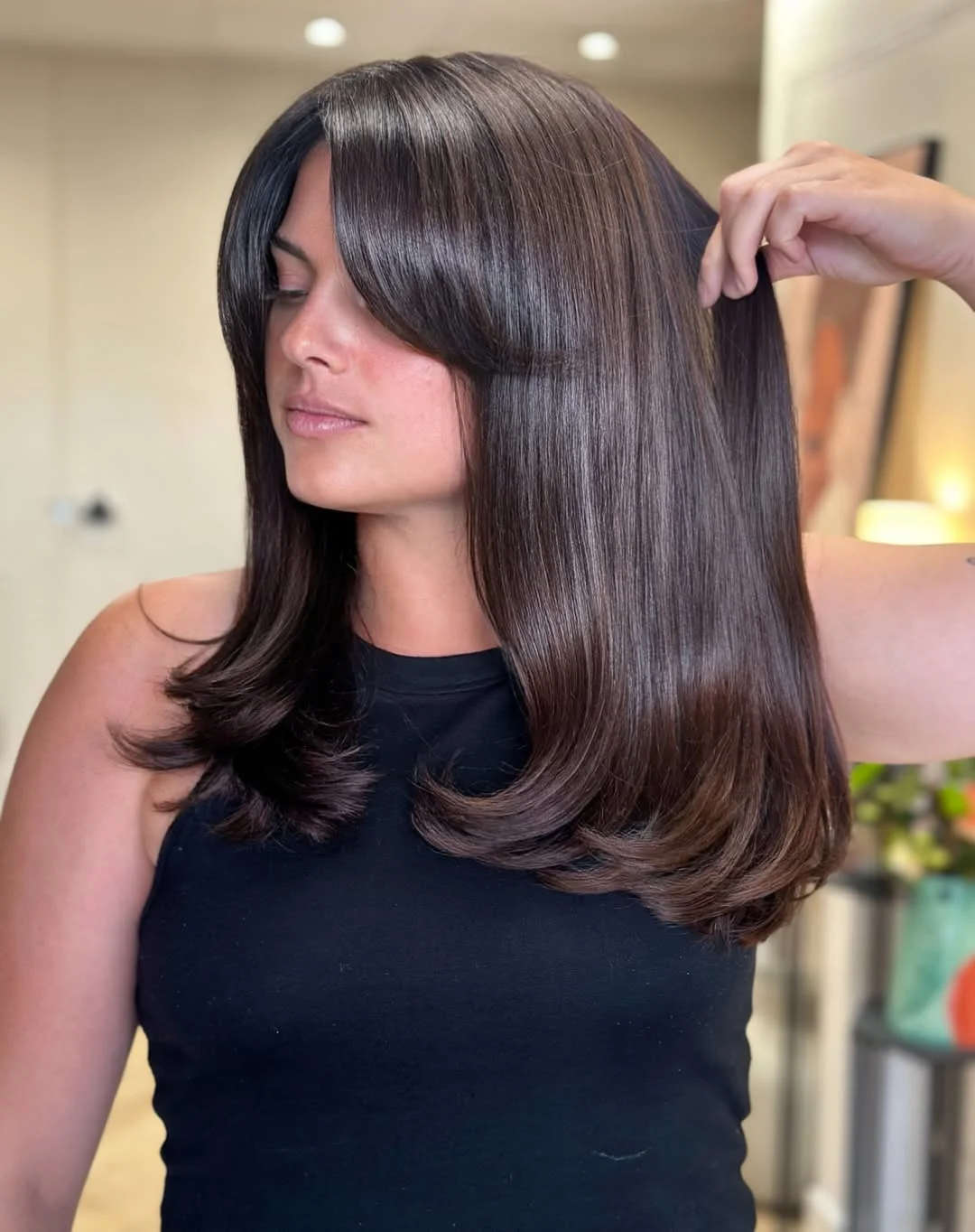 trendy summer brunette hair color 2026 Sleek Espresso Brunette With Smooth Curved Layers