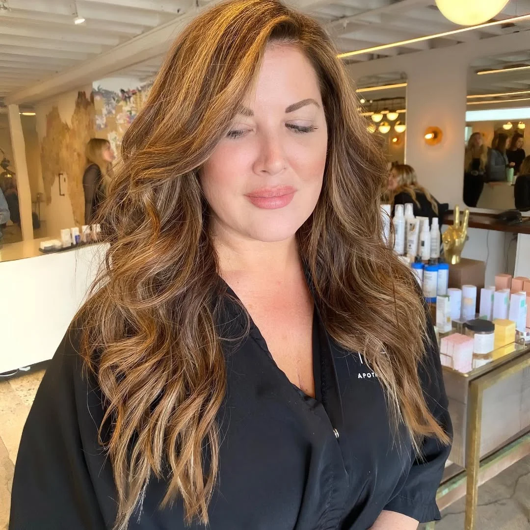 trendy summer brunette hair color 2026 Golden Cinnamon Brunette With Voluminous Waves