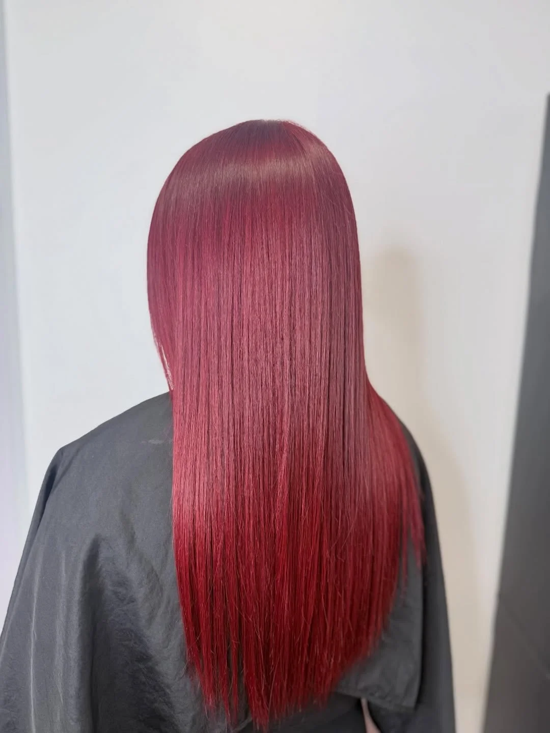 trendy summer red hair color 2026 Silky Straight Red with Cool Toned Precision