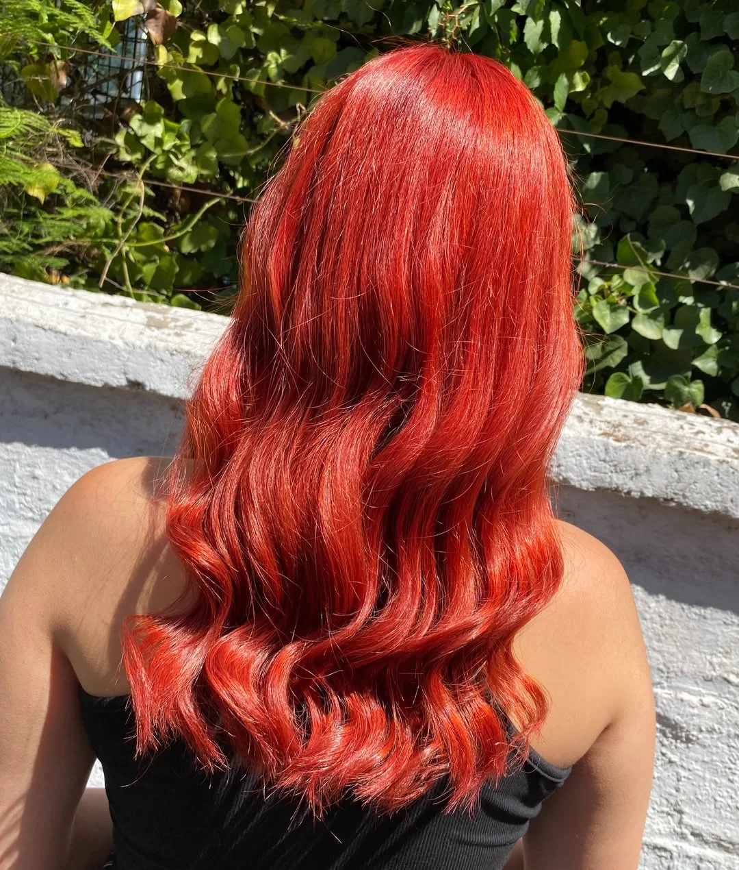 trendy summer red hair color 2026 Sunlit Copper Red Waves That Glow Naturally