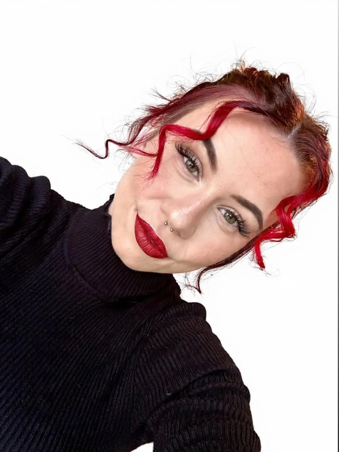 trendy summer red hair color 2026 Edgy Money Piece Red with a Cool-Girl Twist