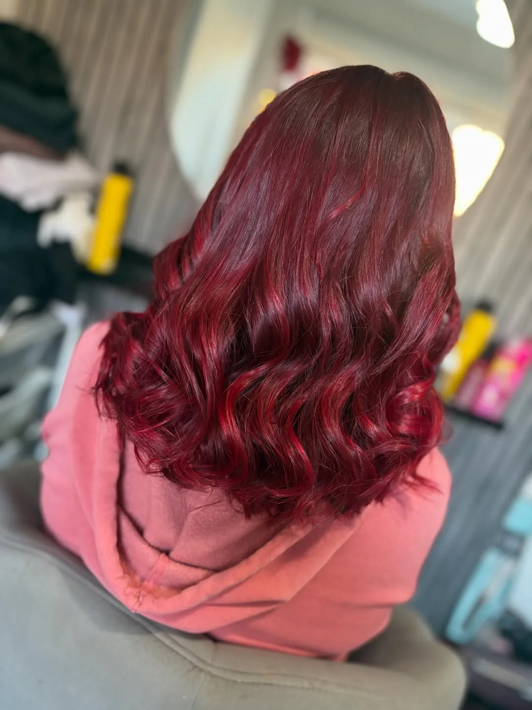 trendy summer red hair color 2026 Soft Burgundy Waves for Medium Length Elegance