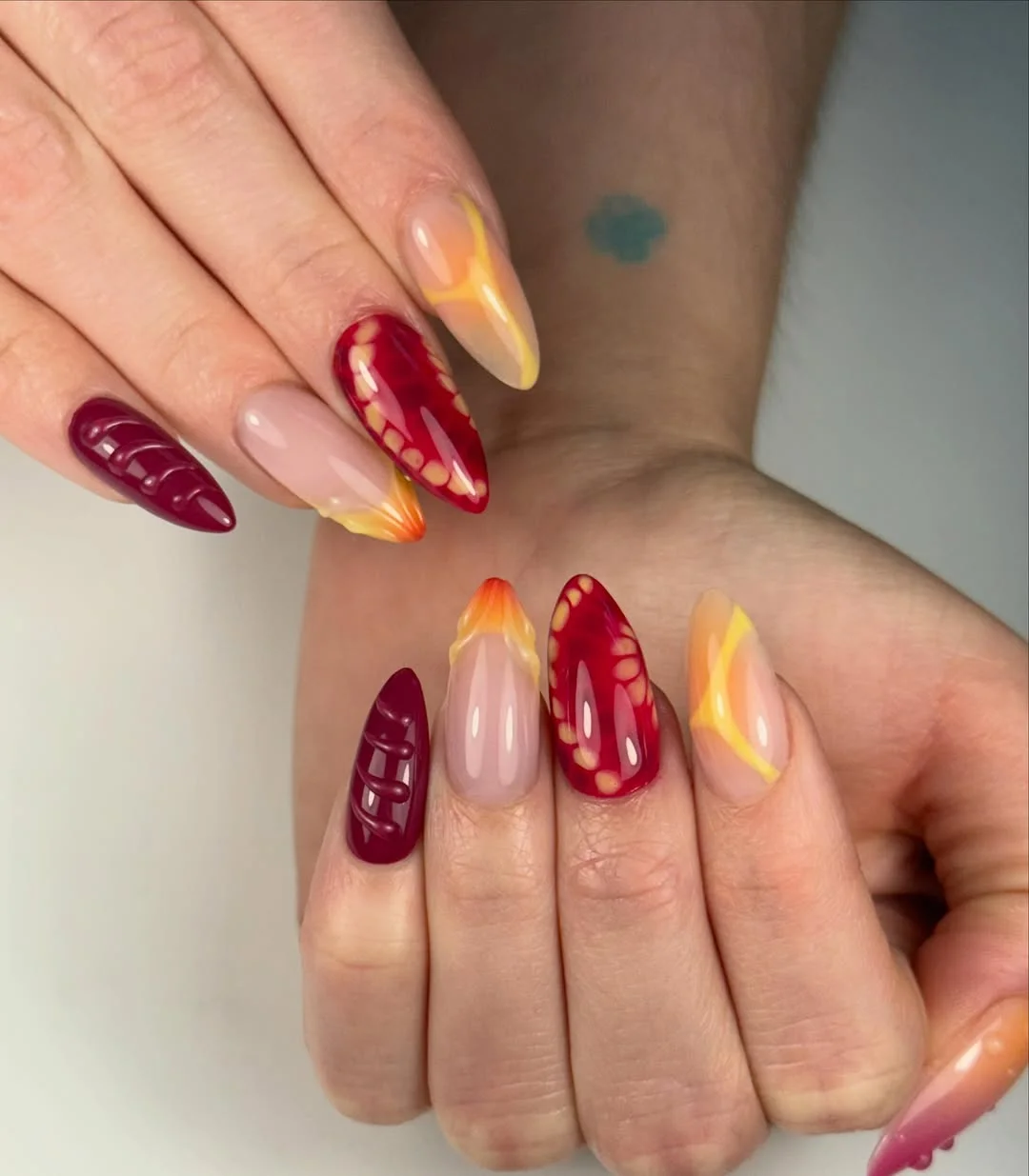 bright summer nails 2026 Sunset Flame Stiletto Nails for Bold Summer Evenings