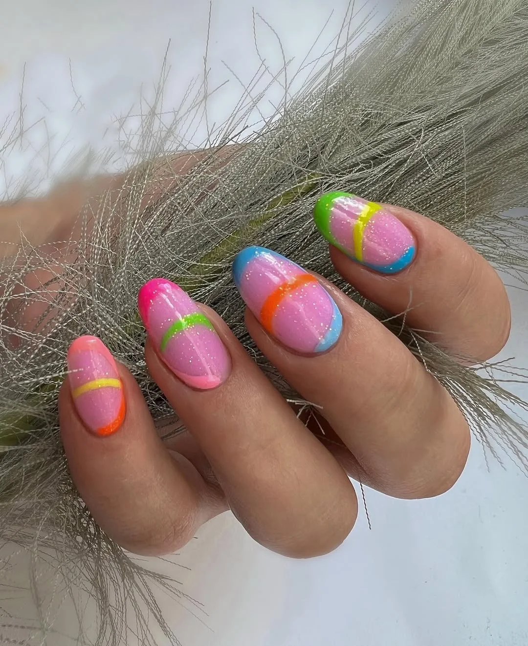 bright summer nails 2026 Rainbow Neon Lines on a Candy Pink Base