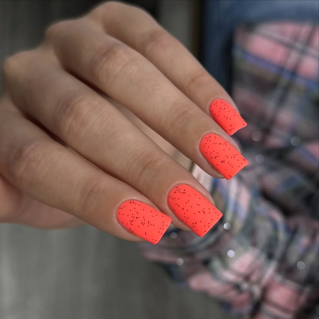 bright summer nails 2026 Neon Coral with Speckled Texture