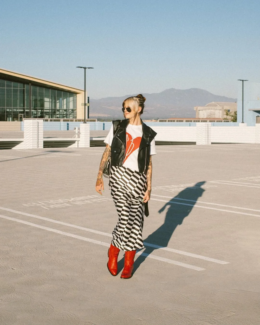 Early fall outfits ideas 2026 Graphic Tees And Statement Boots For Creative Fall Styling