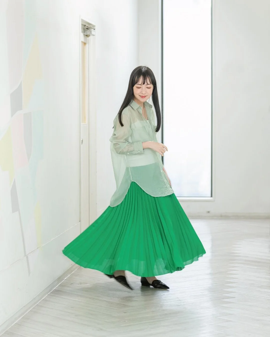 Early summer outfits 2026 Soft Green Pleats That Feel Fresh And Artistic
