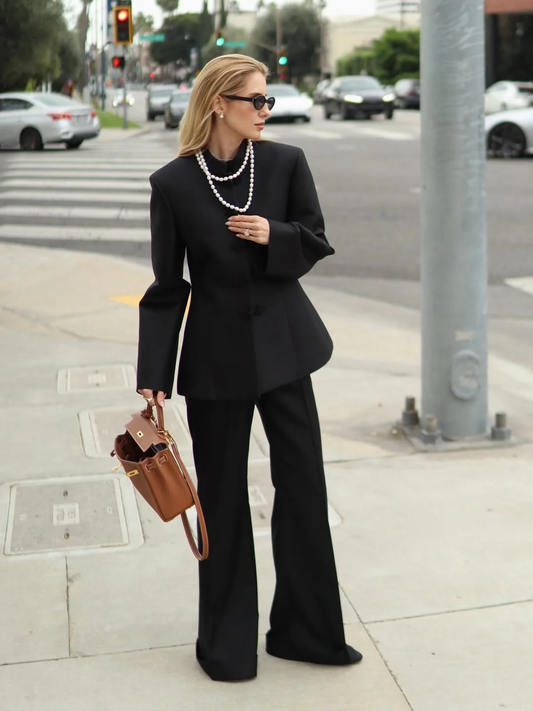 elegant fall office outfits 2026 Minimalist Black Suiting With Statement Accessories