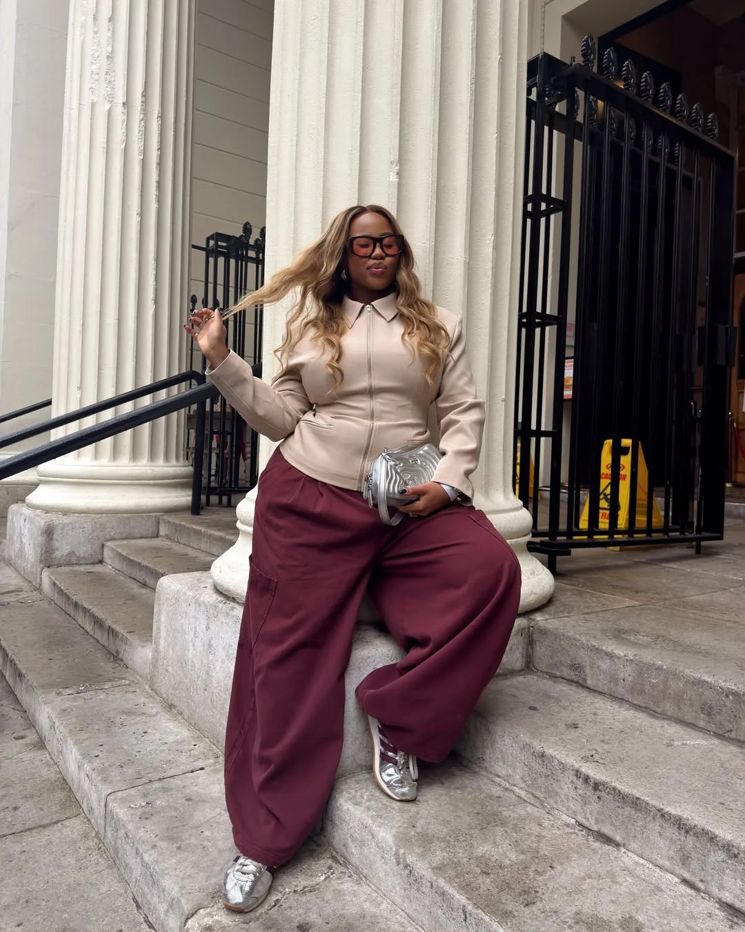 fall 2026 outfits for black women Soft Neutrals Paired With Relaxed Burgundy Trousers