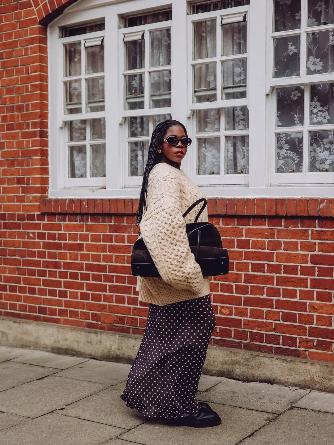 fall 2026 outfits for black women Cozy Knitwear Meets a Flowing Polka Dot Maxi