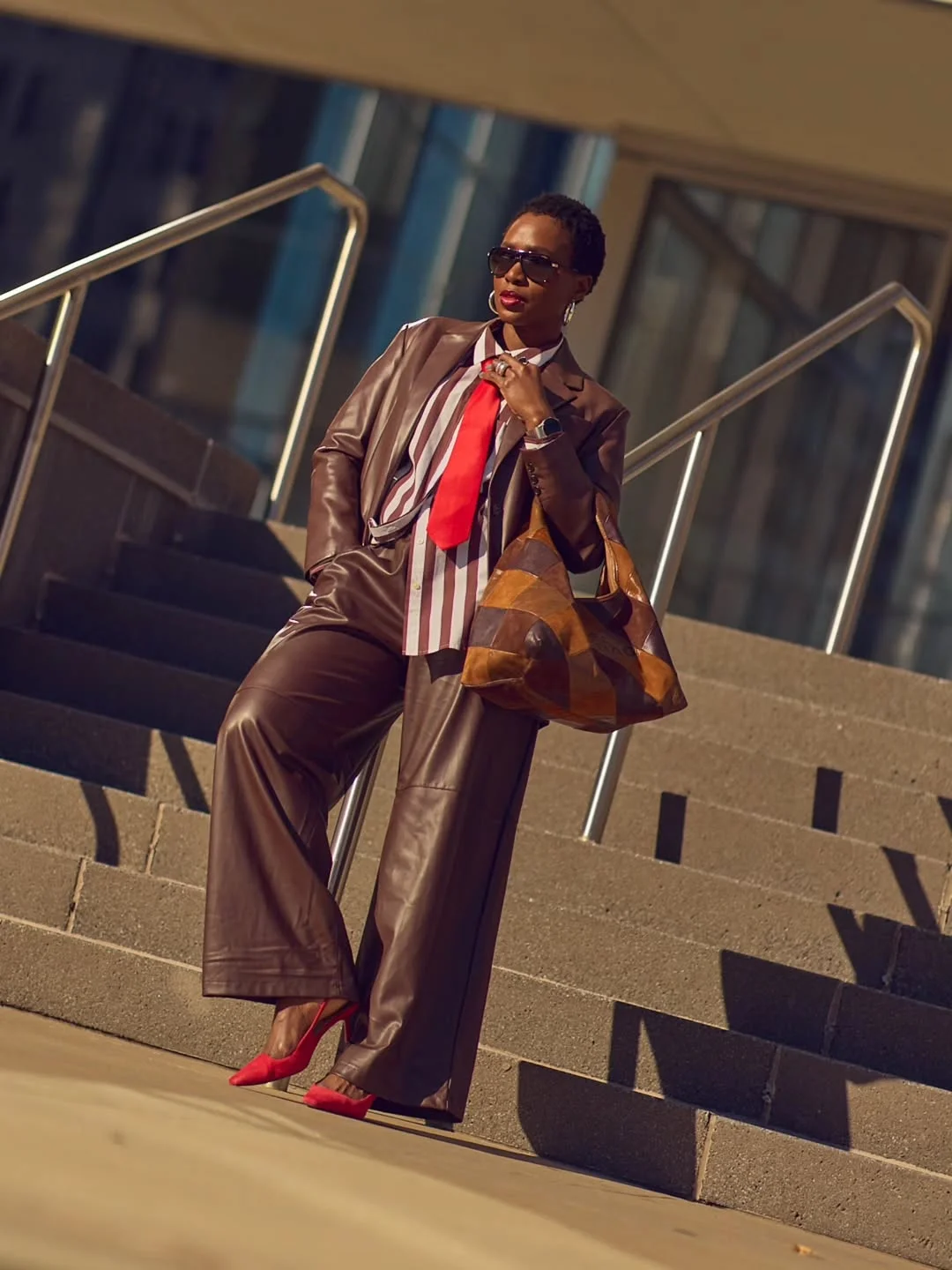 fall 2026 outfits for black women Chocolate Leather Tailoring With a Bold Pop of Red