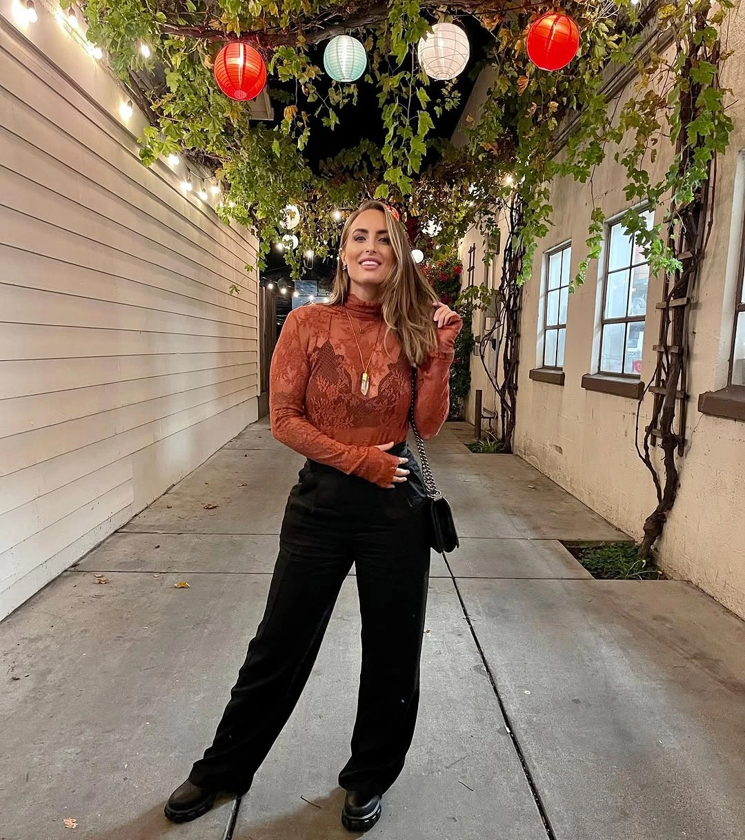 fall date night outfits 2026 Rust Lace and Black Trousers for an Effortlessly Dressy Look