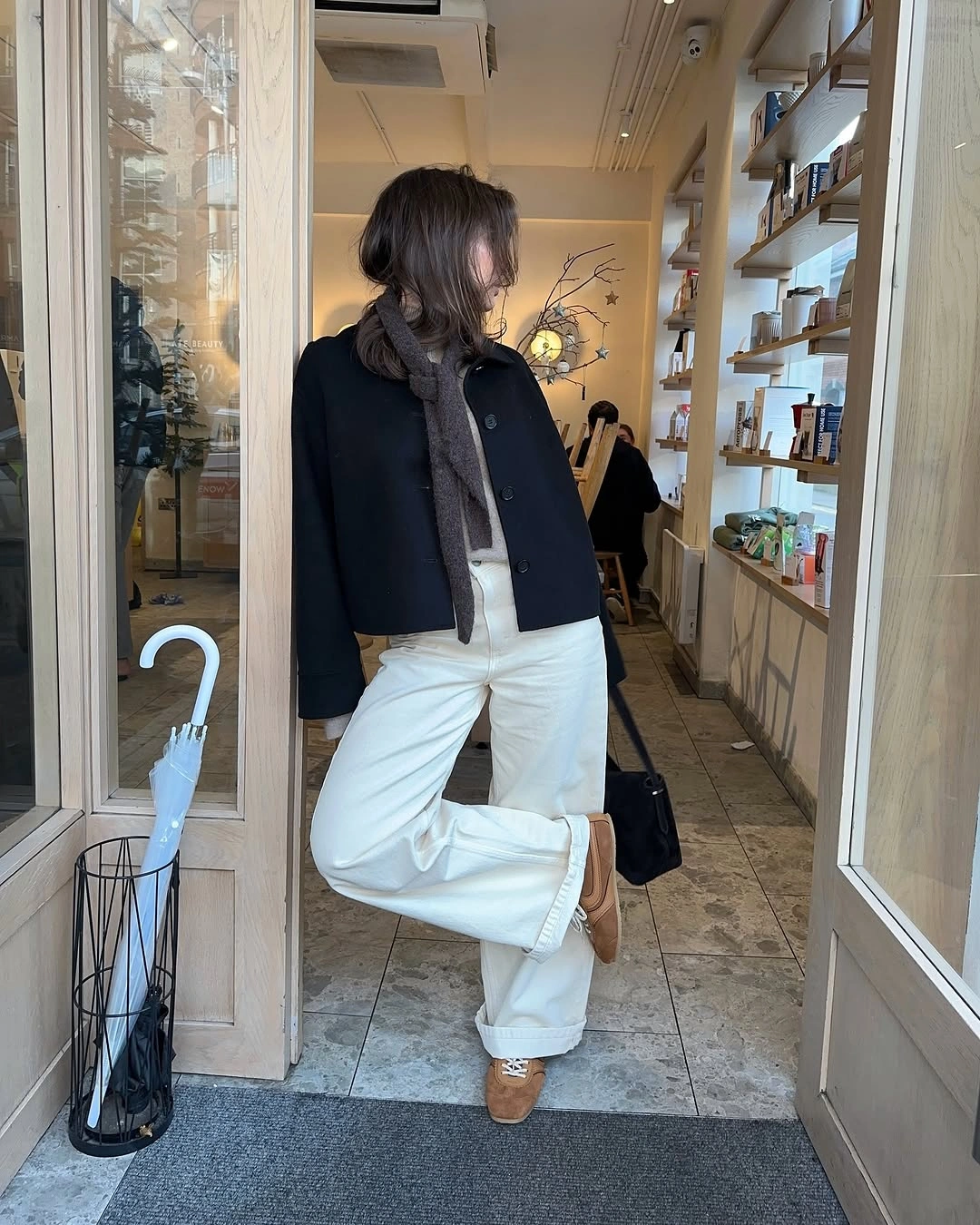 fall going out outfits 2026 Minimal Café Style with Cream Denim and Cropped Tailoring