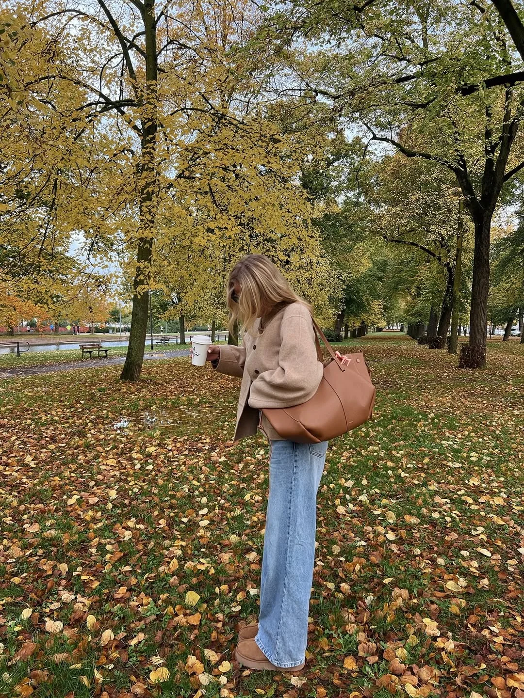 Fall outfits ideas 2026 Oversized Coats and Coffee Walks Through the Park