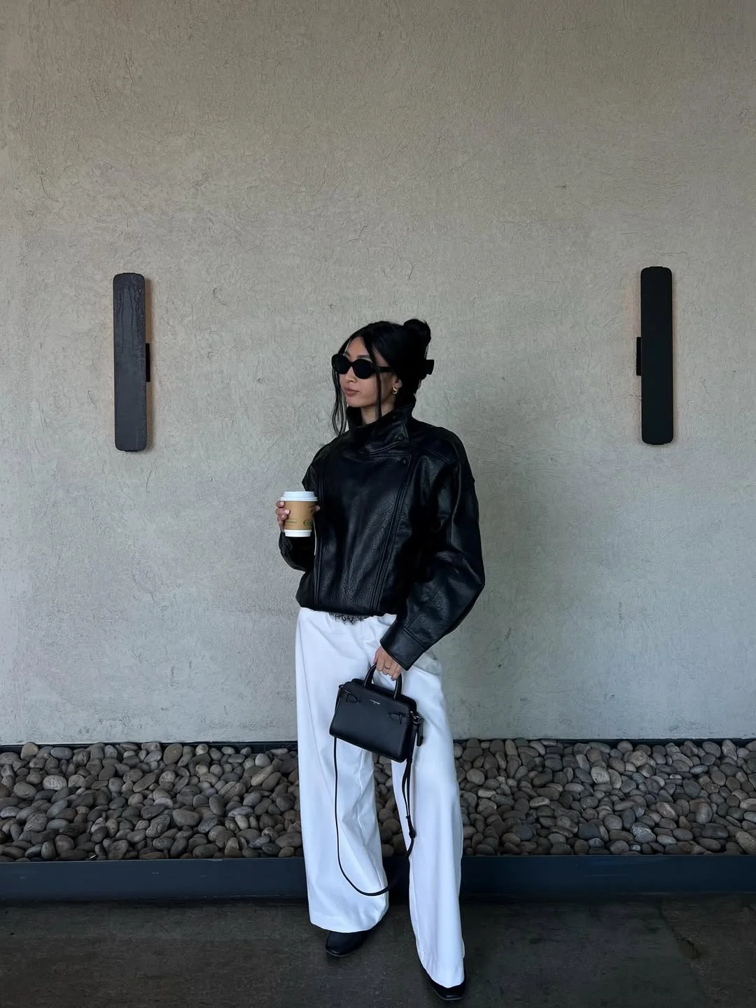 fall outfits with jacket 2026 Black Leather and White Trousers for a Modern City Uniform