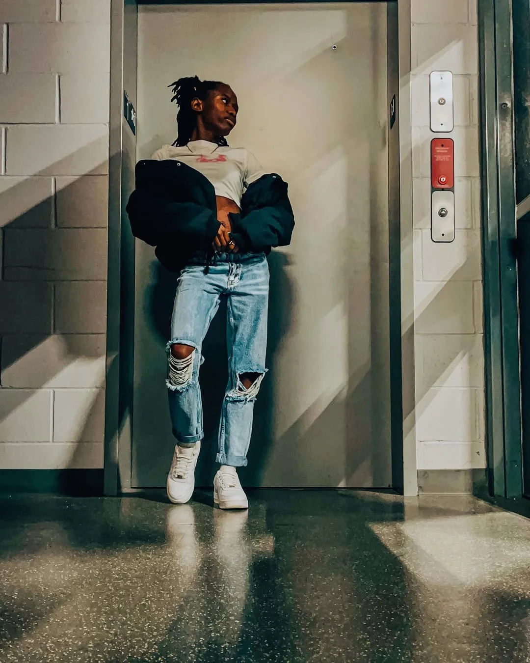 fall outfits with jeans and sneakers 2026 Distressed Denim and White Sneakers With Streetwear Edge
