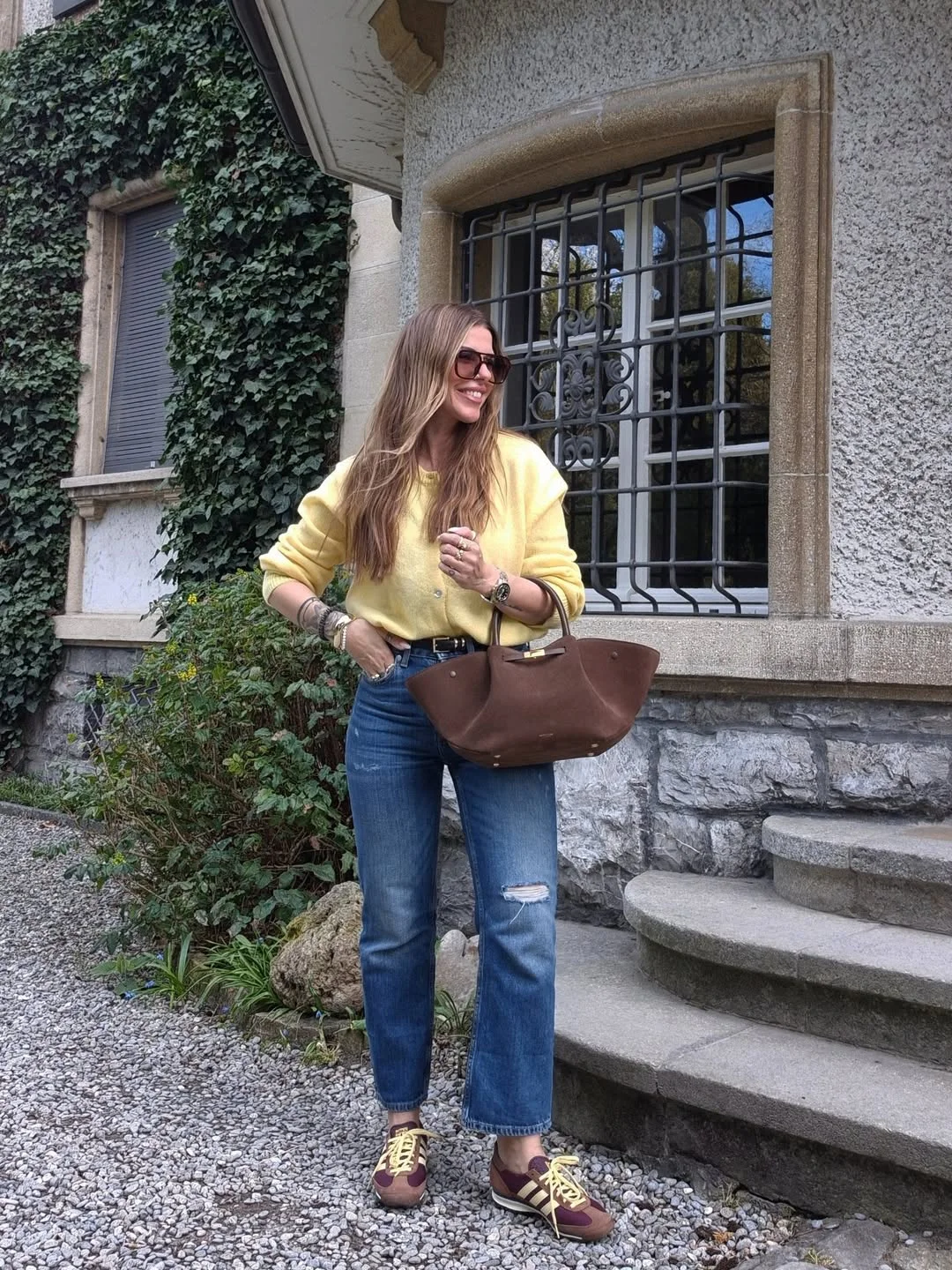 fall outfits with jeans and sneakers 2026 A Soft Yellow Sweater That Brightens Autumn Denim