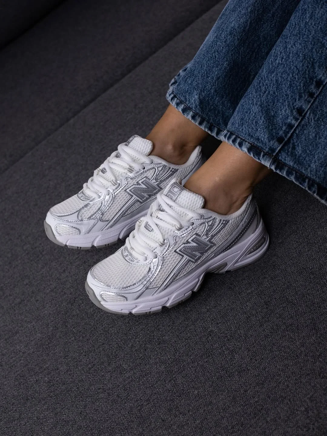 fall outfits with jeans and sneakers 2026 The White Sneaker Trend That Keeps Winning Every Fall