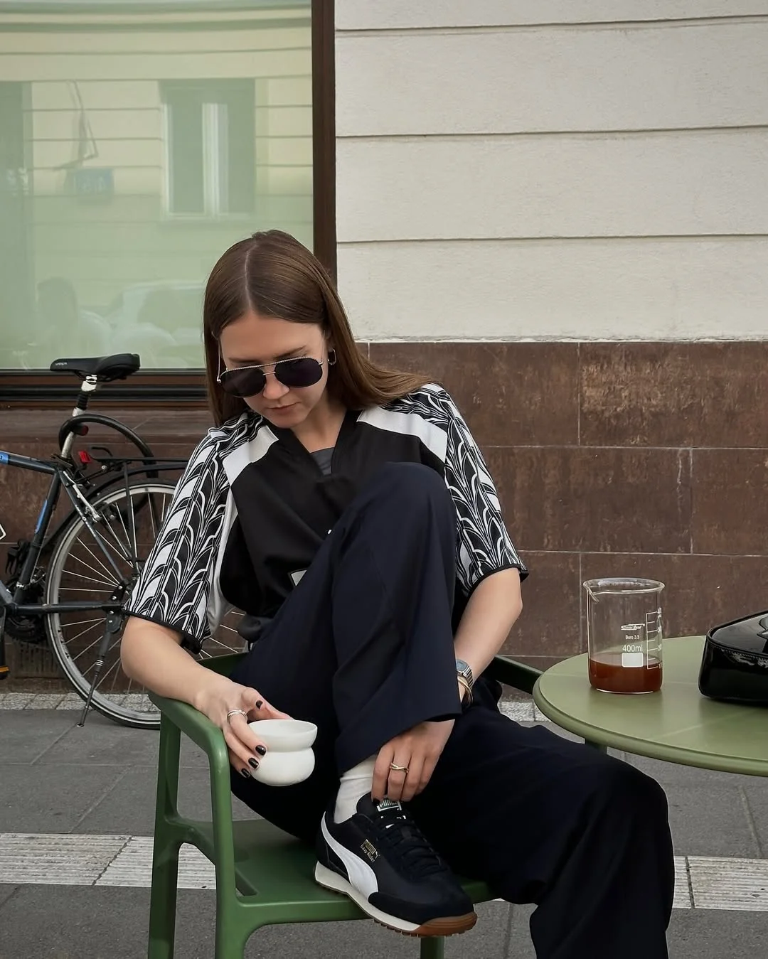 fall outfits with sneakers 2026 Sporty Minimalism with Dark Sneakers and Relaxed Trousers