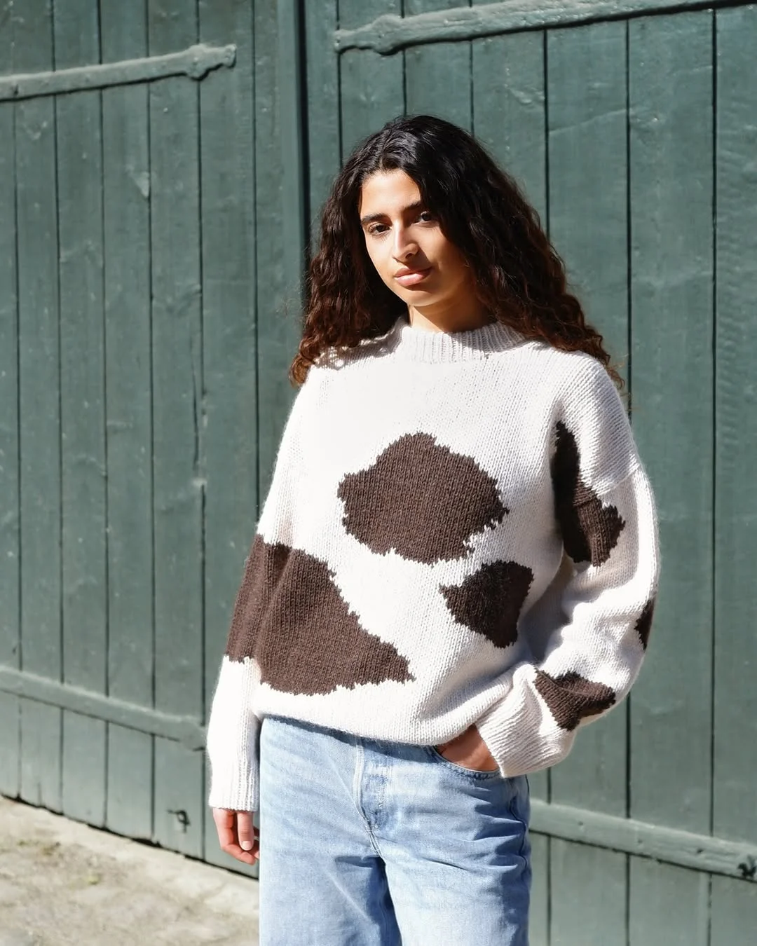 fall outfits with sweater 2026 Modern Cow Print Knit With Relaxed Denim Balance